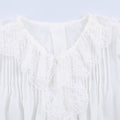 Blusa Elegante de Encaje con Botones de Perla – Manga Larga